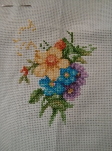 I love watching the flowers grow as I stitch!